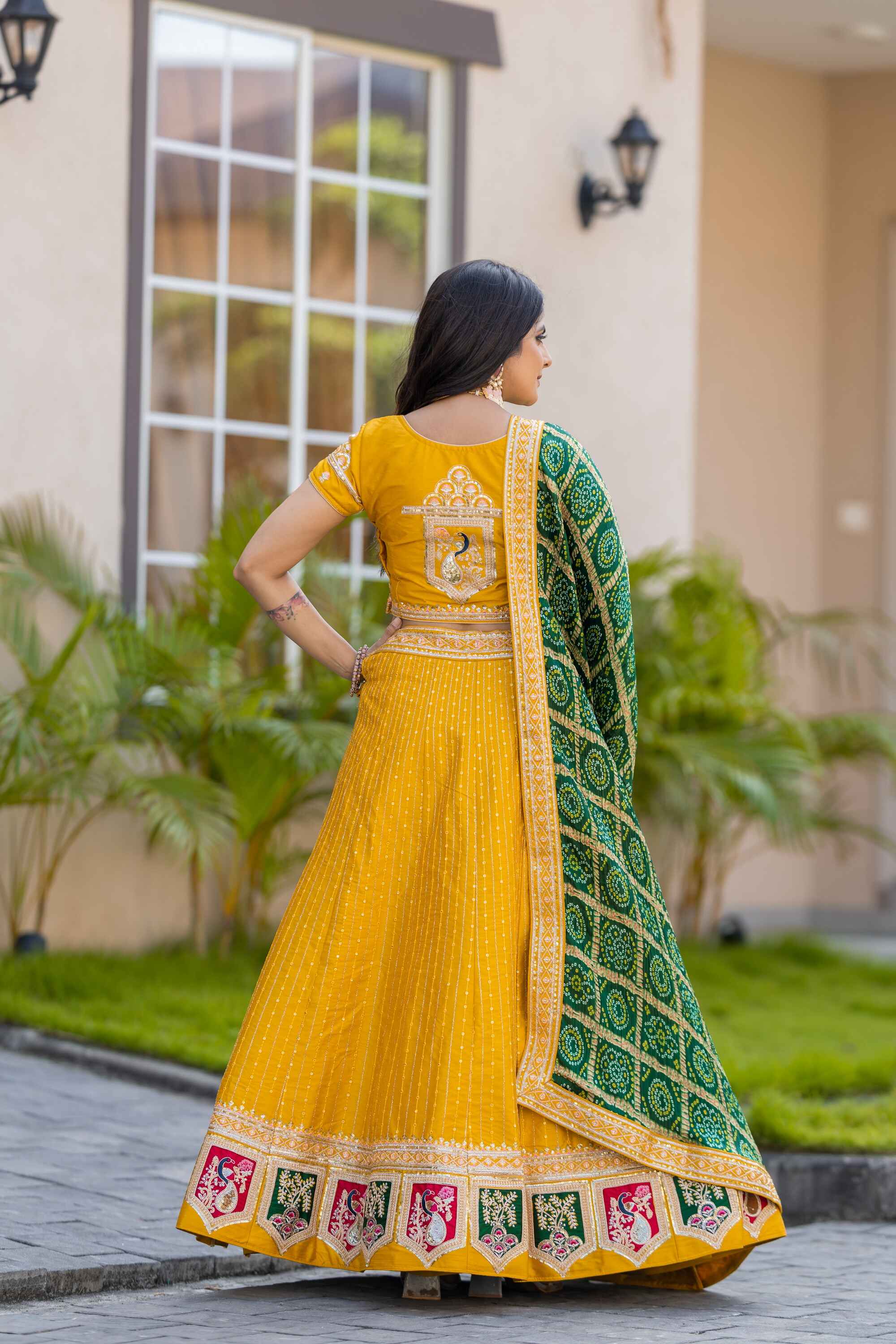 Sajli Yellow Silk Lehenga Choli With Bandhej Dupatta S39